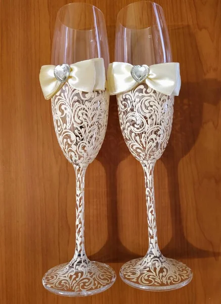 Champagne glasses on wooden background — 图库照片