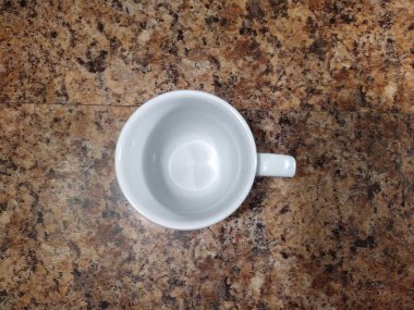 Cup on kitchen table background