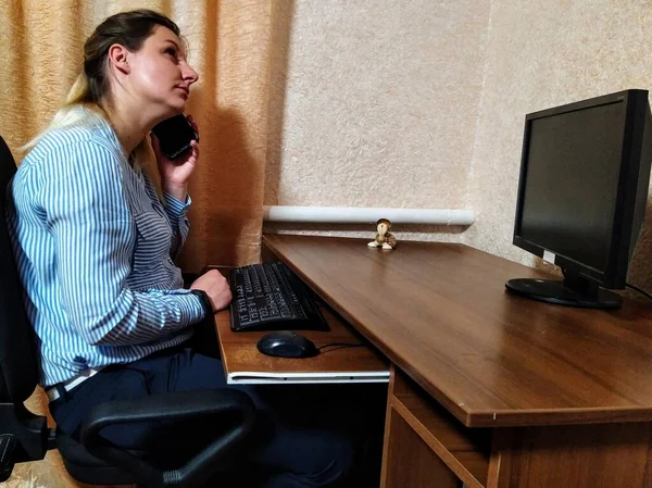 Pensive European Young Woman Sit Table Talk Smartphone Work Computer — Stock Photo, Image