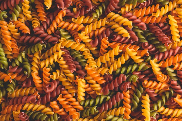 Tricolore Crudo Fusilli Pasta Torsione Forme Sfondo Foto Stock Pasta — Foto Stock