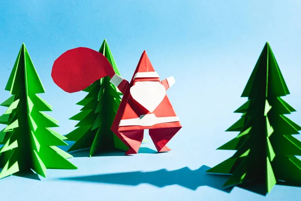 Origami Weihnachtsmann Mit Einem Sack Voller Geschenke Cartoon Postkarte Archivbild — Stockfoto