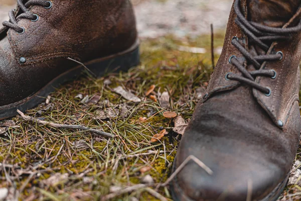 Guy hiking in comfortable hiking boots. Boots close-up stock photo.