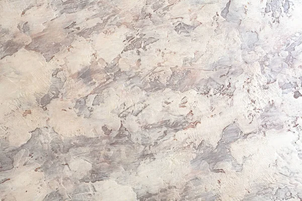 Wall decor, strokes of plaster. Stock photo art texture of putty.