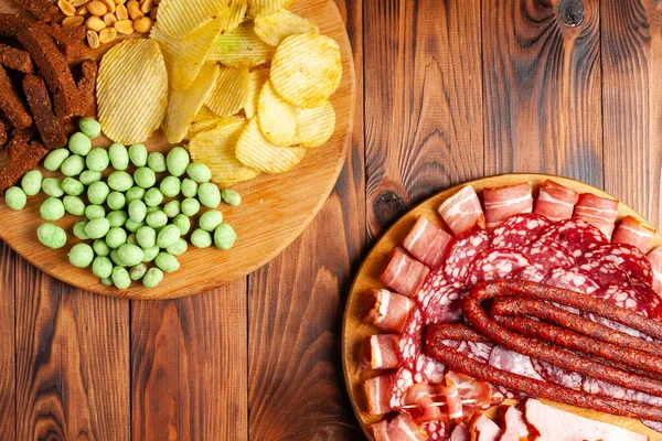 Assorted Beer Snacks Wooden Table Copy Space Sausage Ham Bacon — Stock Photo, Image