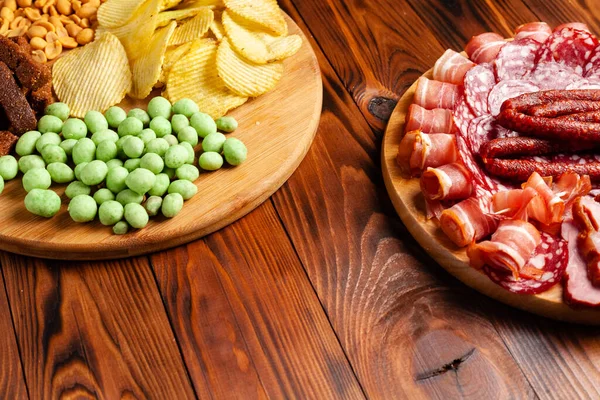 Assorted Beer Snacks Wooden Table Copy Space Sausage Ham Bacon — Stock Photo, Image