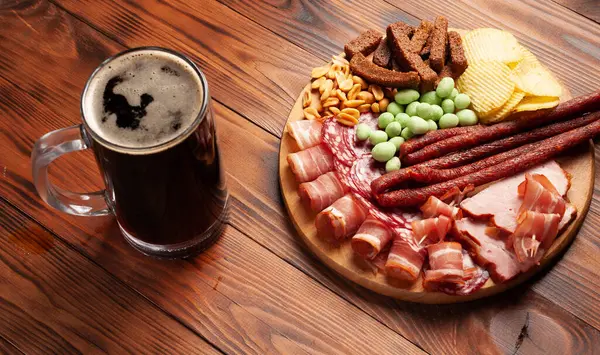 Mug Beer Assortment Snacks Wooden Table Sausage Salami Ham Bacon — Stock Photo, Image