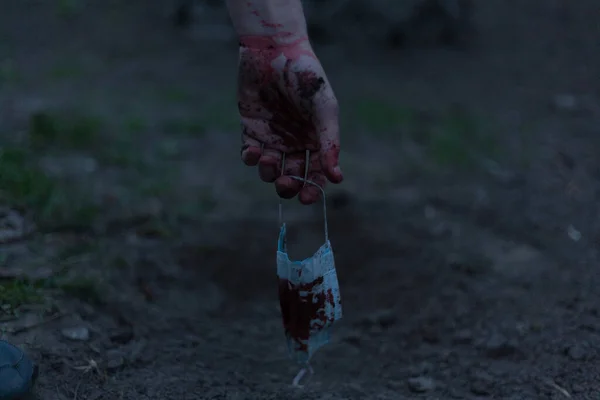 Medical Bloodied Mask Lies Ground Bloody Hand Reaching Out Concept — Stock Photo, Image