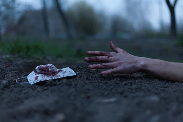 Medical Bloodied Mask Lies Ground Bloody Hand Reaching Out Concept — Stock Photo, Image