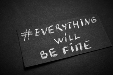 Everything will be fine. The inscription in chalk on a black paper background. clipart