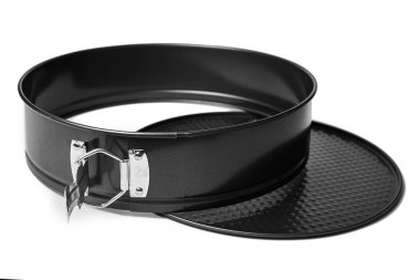 Yuvarlak metal pişirme kabı, izole. Çıkarılabilir tamponları olan pişirme biçimi.