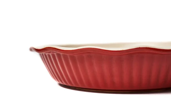 圆形烘烤盘 独立于白色背景 水平的特写红色 不是新的 — 图库照片