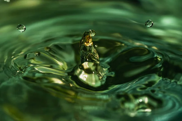 green water drop splash, water abstract background