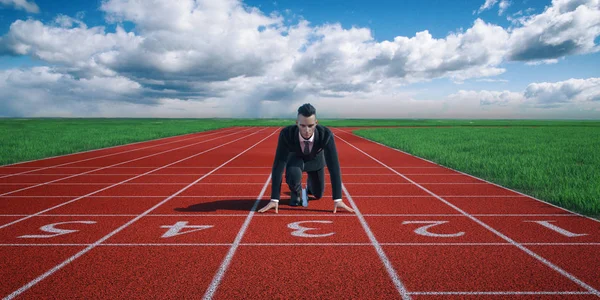 Businessman ready to sprint on starting line. — Stock Photo, Image