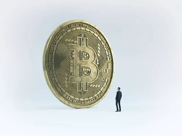 Gouden bitcoin teken en zakenman — Stockfoto