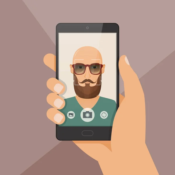 Hipster barbudo jovem leva selfie usando um smartphone . —  Vetores de Stock