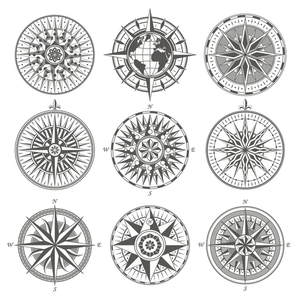 Set of vintage antique wind rose nautical compass signs labels e — Stock Vector
