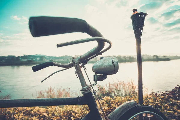 Beautiful landscape image with Bicycle white at sunset — Stock Photo, Image