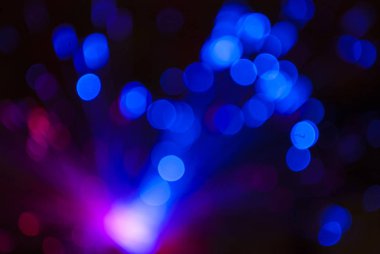 Neşeli, ışıl ışıl renkler taşar. Odaklanamayan kaotik çemberler Bulanık bokeh.