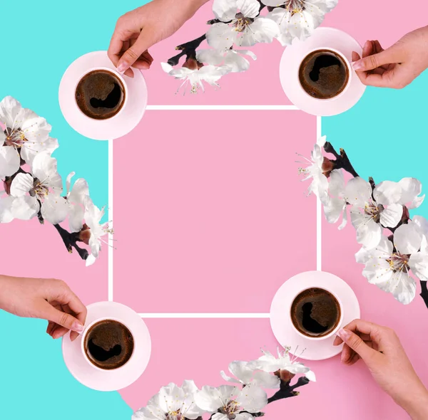 Frame for text white flowers of coffee on a pink, blue background. Good morning. Congratulations. Four cups. Empty space.