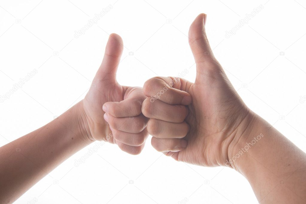 Hand of mom and son thumb up to each other 