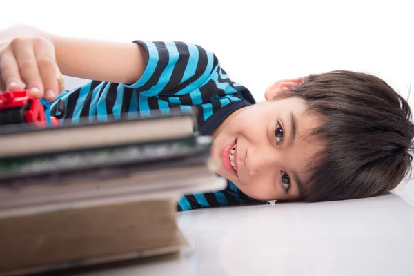 Little boy playing with car toy free time after study from school — Stock Photo, Image