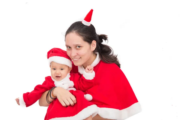Mutter und Baby im Weihnachtsmannkostüm — Stockfoto