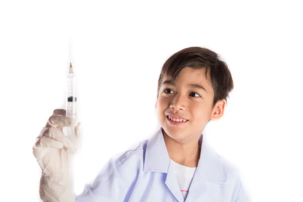 Niño vistiendo traje de médico uniforme — Foto de Stock