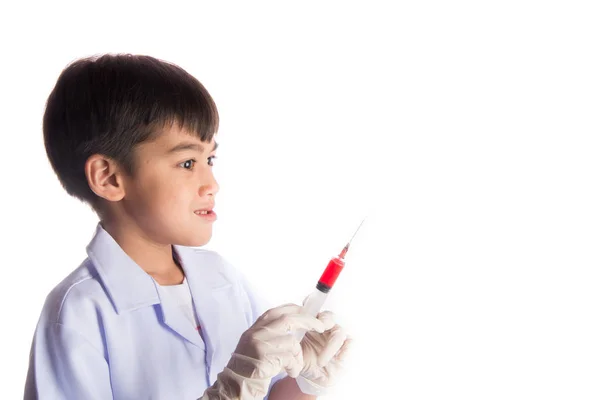 Chlapeček s injekční stříkačkou lék — Stock fotografie