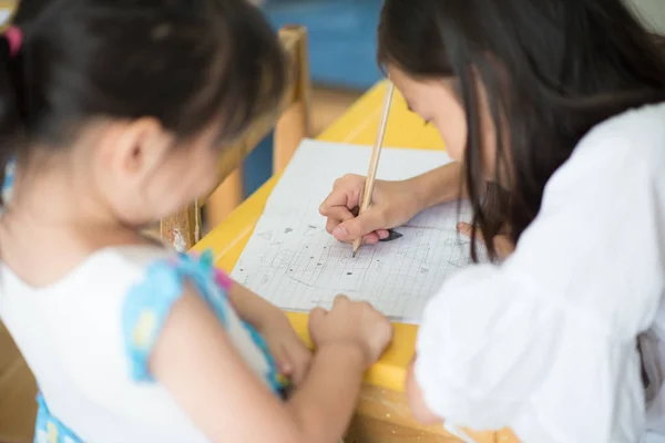 Little Asian Girl Writing Notebook School Class — Stock Photo, Image