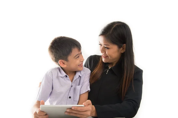 Mother and son playing tablet learn together with happy face
