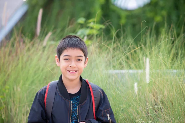 Little Young Boy Picking Grass Flower Field — Stock Photo, Image