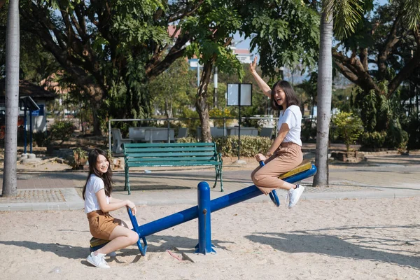 Two Cute Girls Playing Seesaw Park — Stock Photo, Image