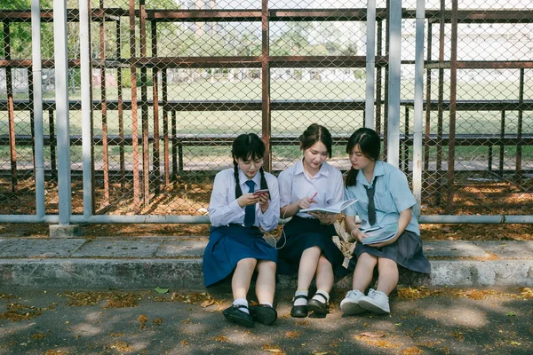 Three Students Sitting Side Road Stands — Stock Photo, Image