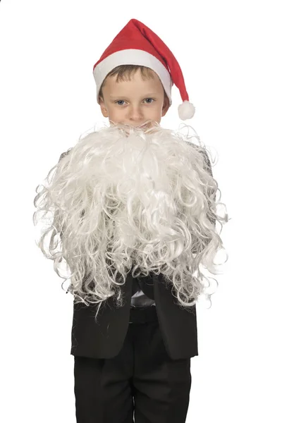 Junge ist als Weihnachtsmann verkleidet. — Stockfoto