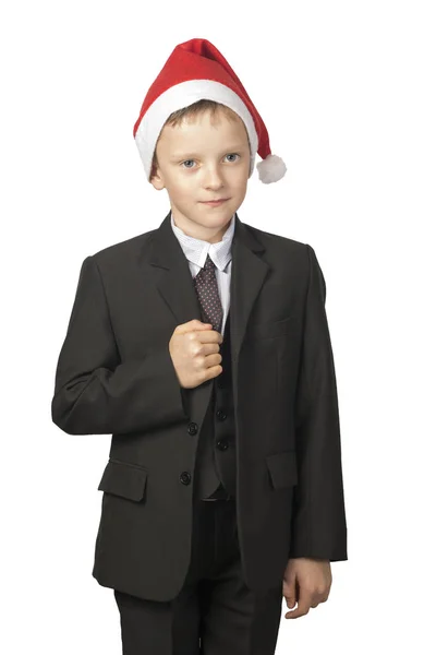 Menino está vestido de Papai Noel . — Fotografia de Stock