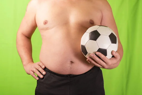 胃を持つ男は手に機器を保持します。超過重量. — ストック写真