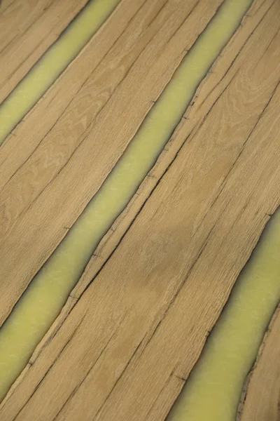 Texture of a wooden table countertop with epoxy resin stripes. — Stok Foto