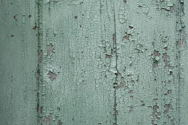 Pintura pelada sobre textura de pared envejecida. Patrón de material azul rústico . — Foto de Stock