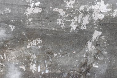 Benekli eski beton duvar dokusu parçası ve soyut arka plan bileşimi olarak çizikler.