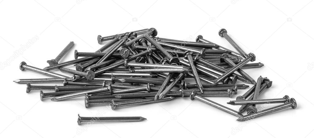 Close-up pile of small grey metal nails isolated on white background. Stainless fastener used in construction