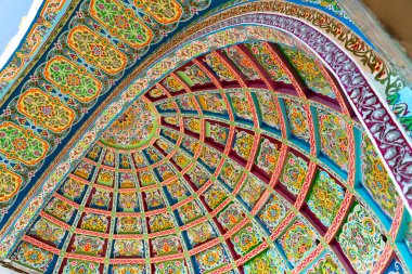 The main entrance to old soviet historical central bazaar Panjshanbe Bozor and beautiful decoration on the ceiling in Khujand in Tajikistan clipart