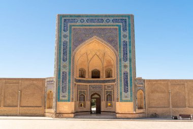 The Mir Arab madrasasi main gate in Bukhara, Uzbekistan clipart