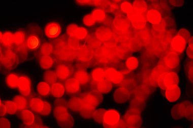 Bokeh kırmızısı bulanık ışıklar soyut renk.