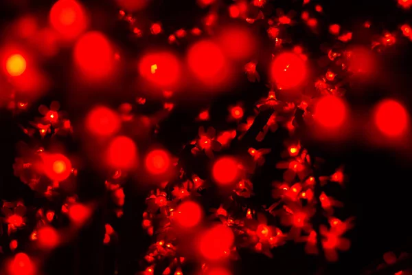 Bokeh vermelho luzes embaçadas cor abstrata . — Fotografia de Stock