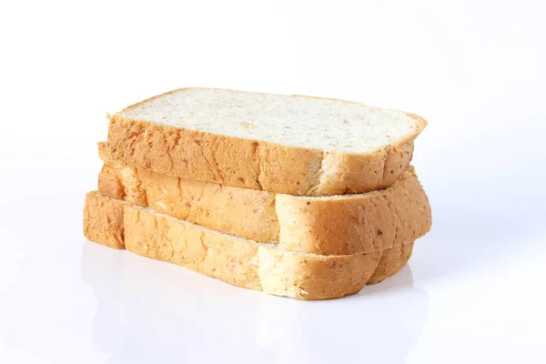 Dilim Ekmek Beyaz Zemin Üzerine — Stok fotoğraf
