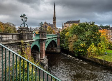 Kelvin Bridge on Great Western Road, Glasgow with church spires  clipart
