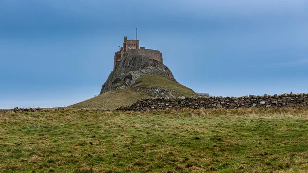 Looking across the fields to Lindisfarne Catle on Holy Island — Stock Photo, Image