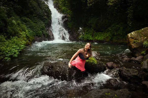Happy Caucasian Woman Sitting Rock Playing Water River Waterfall Travel — Stock Photo, Image