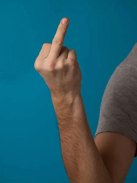 Middle Finger Offensive Gesture Fuck You Concept Blue Background — 图库照片