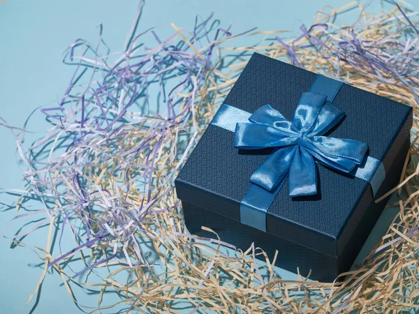 gift box on blue background. colorful gifts box. empty space for your text